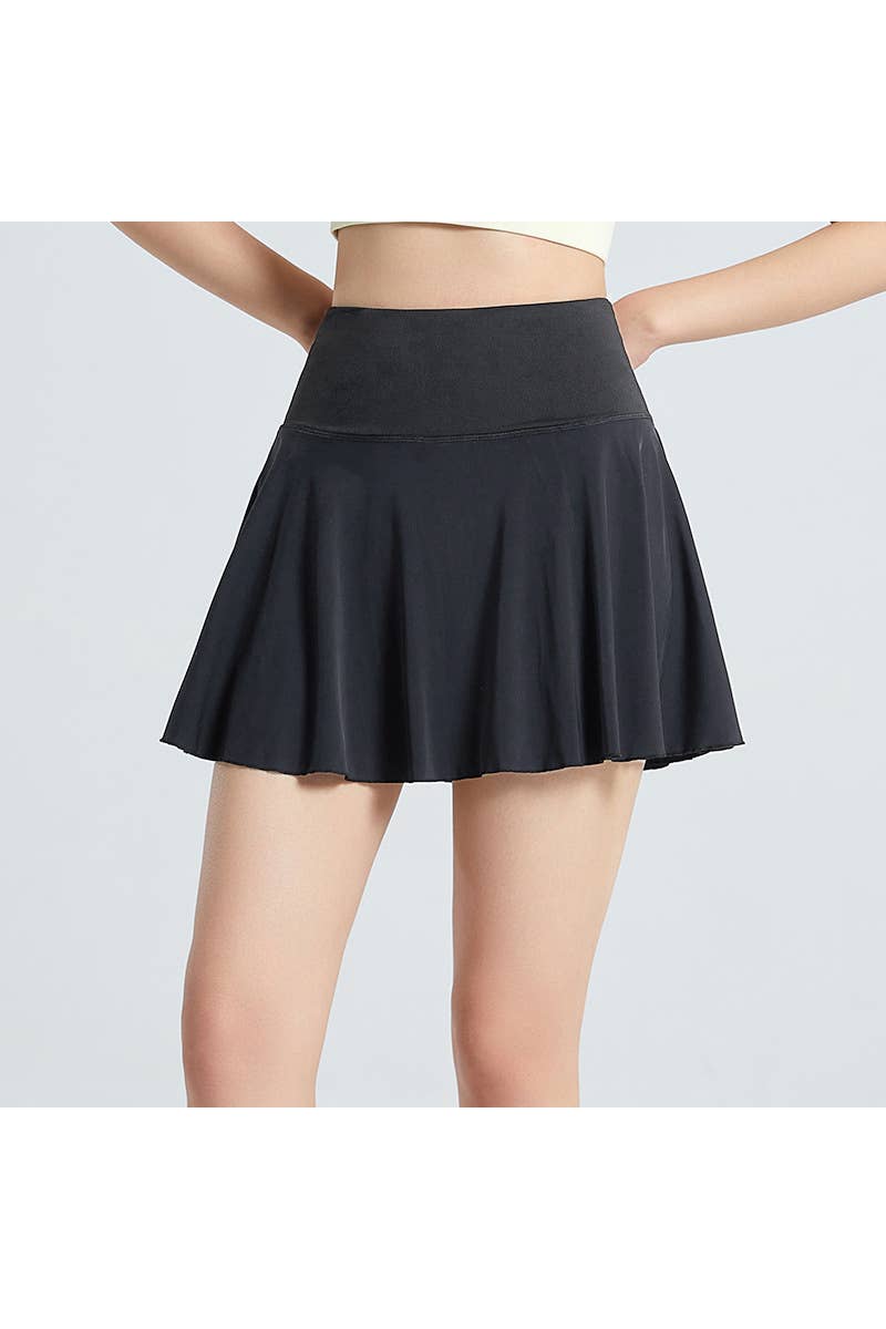 Solid color athletic skorts feature under shorts w/pockets
