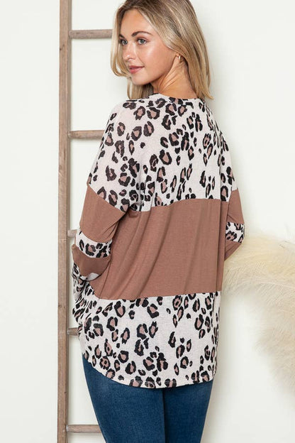 Fierce and Fabulous: Animal Print Contrast Top