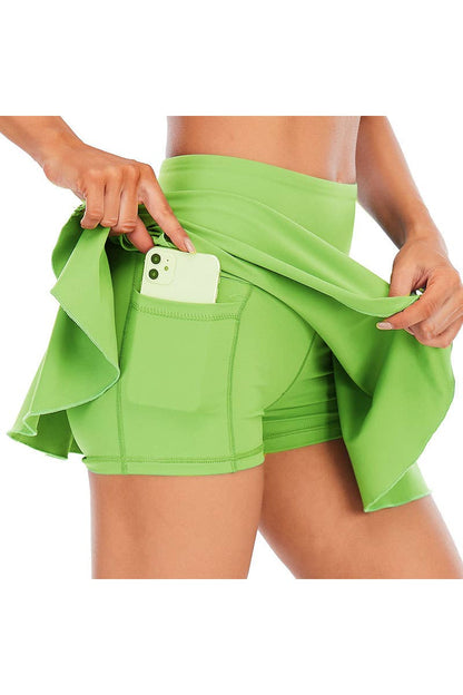 Solid color athletic skorts feature under shorts w/pockets